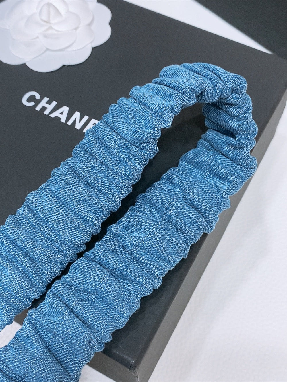 DOUBLE C ELASTIC BELT 30MM IN BLUE DENIM WITH GOLD BUCKLE AND SIDE RHINESTONE DETAILING