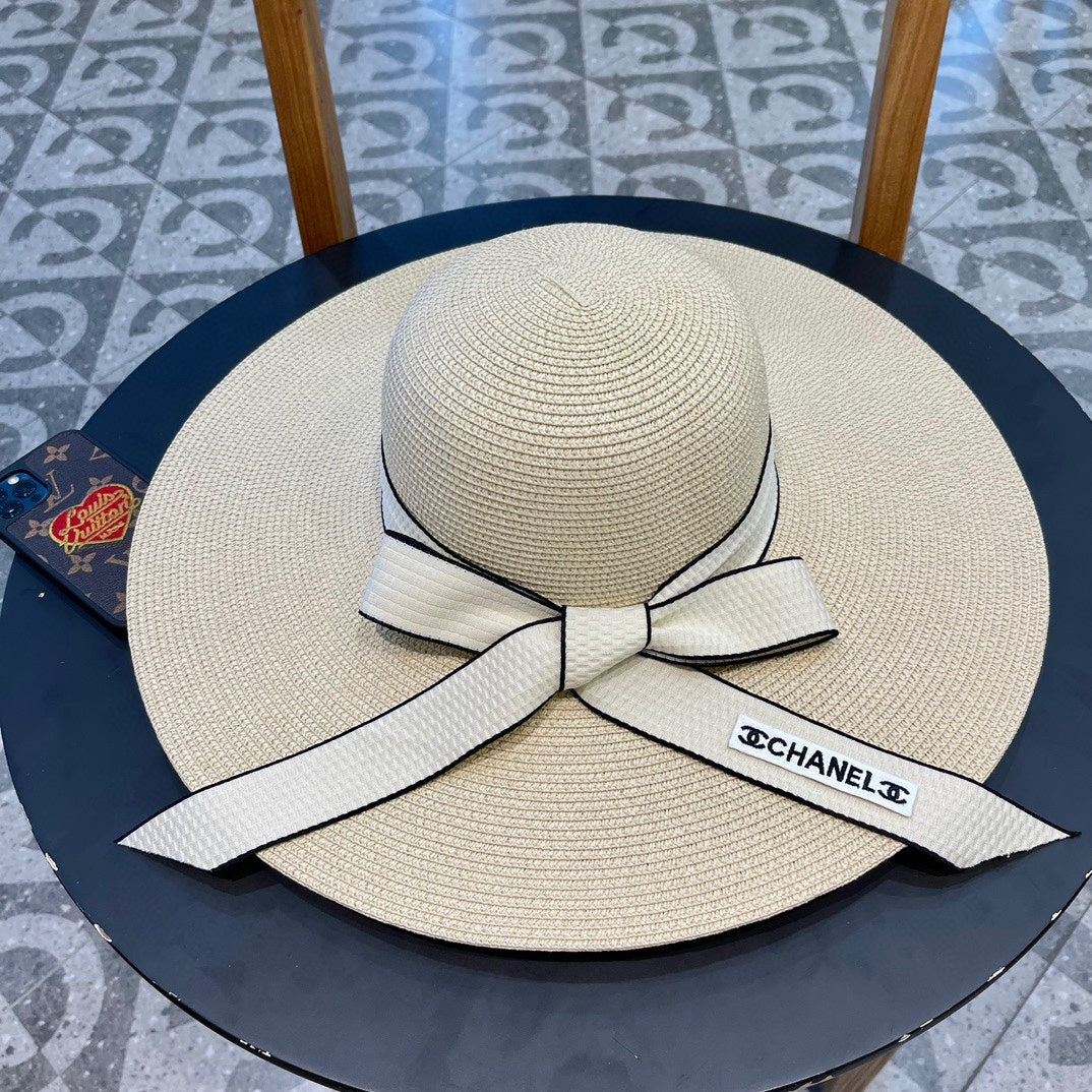 WIDE BRIM STRAW HAT WITH BOW BEIGE 672706