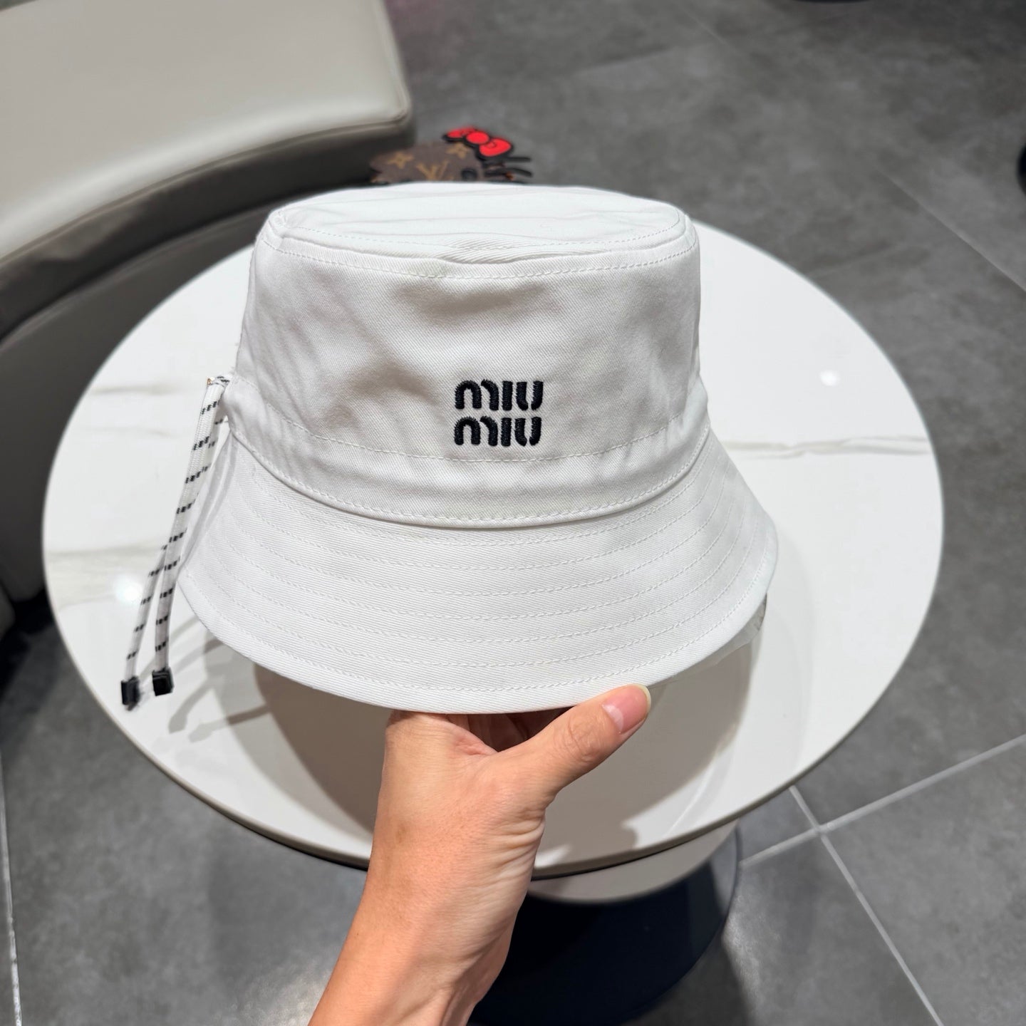 MIUMIU BUCKET HAT STYLE 84