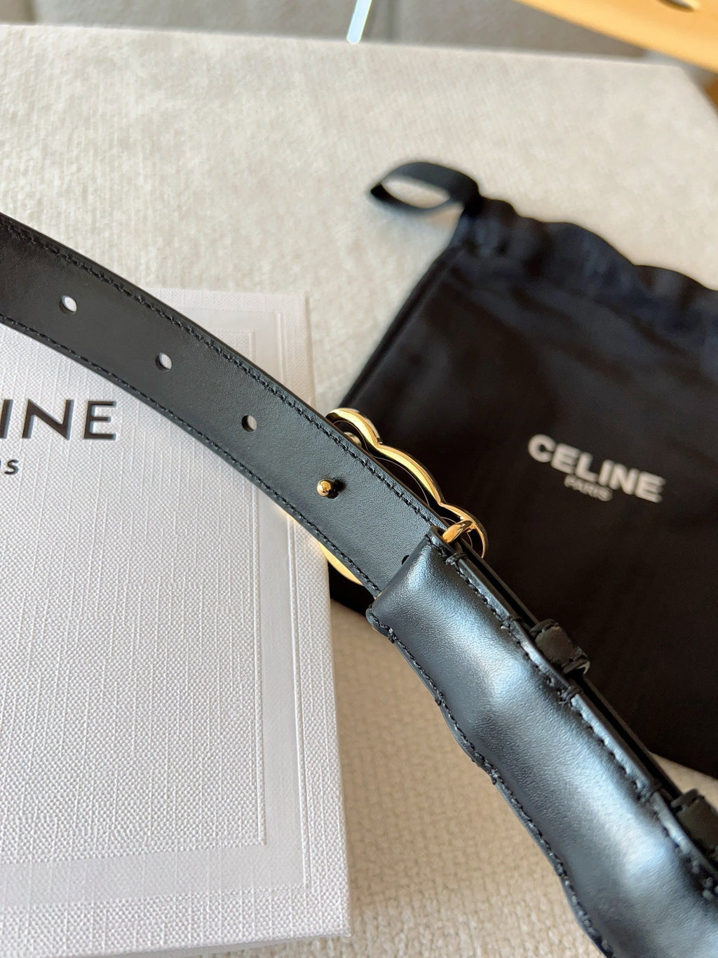 BELT 25MM TRIOMPHE LOGO CUT-OUT IN SMOOTH BLACK CALFSKIN WITH GOLD BUCKLE