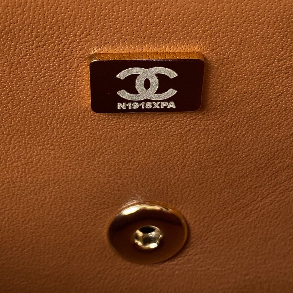 ＣＨＮＥＬFLAP BAG WITH TOP HANDLE RUST
