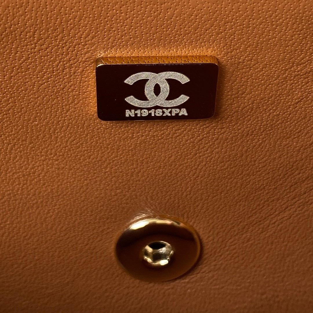 ＣＨＮＥＬFLAP BAG WITH TOP HANDLE RUST