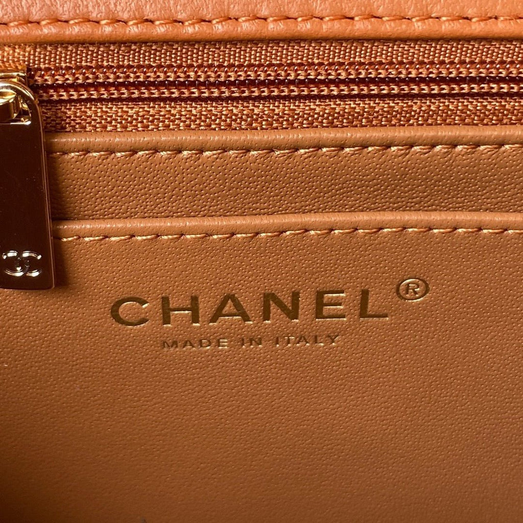 ＣＨＮＥＬFLAP BAG WITH TOP HANDLE RUST