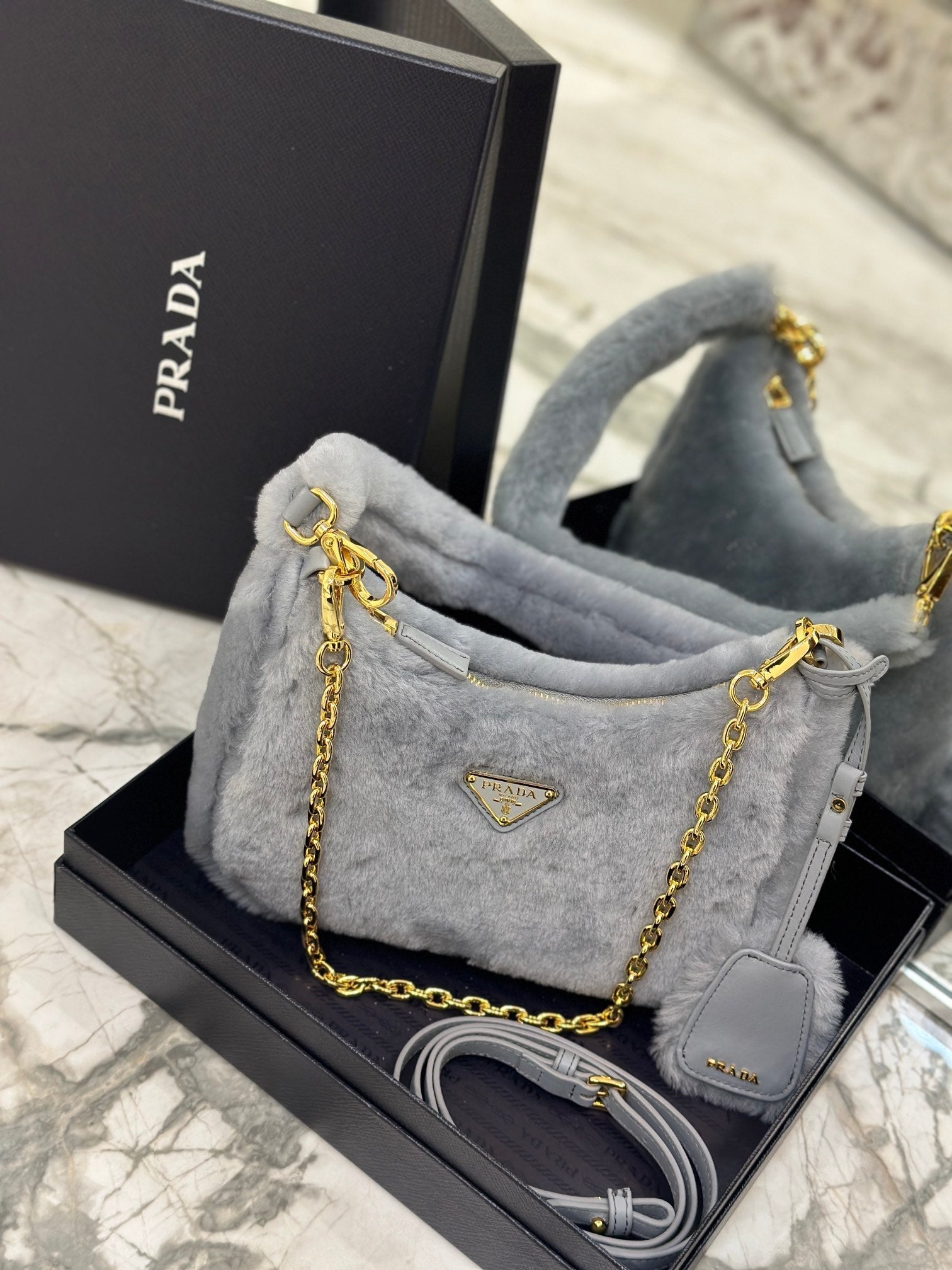 ＰＲＤＡ RE-EDITION SHEARLING MINI-BAG CORNFLOWER